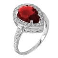 Кольцо из серебра с пл.кварцем цв.гранат и фианитами родированное