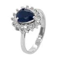 Кольцо из серебра с сапфировым корундом и фианитами родированное