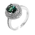 Кольцо из серебра с пл.кварцем цв.изумруд и фианитами родированное