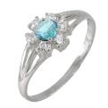 Кольцо из серебра с топазом и фианитами родированное