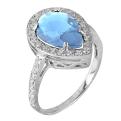 Кольцо из серебра с пл.кварцем цв.голубой и фианитами родированное