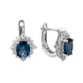Серьги из серебра с нат.топазом лондон блю и фианитами родированные