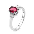 Кольцо из серебра с нат.розовым топазом и фианитами родированное