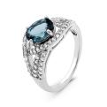 Кольцо из серебра с нат.топазом лондон блю и фианитами родированное