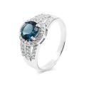 Кольцо из серебра с нат.топазом лондон блю и фианитами родированное