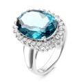 Кольцо из серебра с нат.топазом лондон блю и фианитами родированное