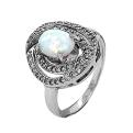 Кольцо из серебра с опалом и фианитами родированное