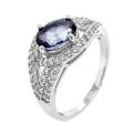 Кольцо из серебра с нат.блю топазом и фианитами родированное