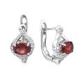 Серьги из серебра с пл.кварцем цв.гранат и фианитами родированные
