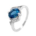 Кольцо из серебра с нат.лондон топазом и фианитами родированное