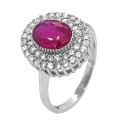 Кольцо из серебра с рубиновым корундом и фианитами родированное