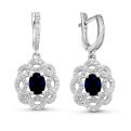 Серьги из серебра с корундом сапфировым и фианитами родированные