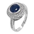 Кольцо из серебра с сапфировым корундом и фианитами родированное