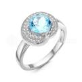 Кольцо из серебра с топазом и фианитами родированное