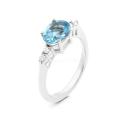 Кольцо из серебра с топазом и фианитами родированное