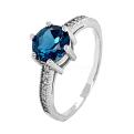 Кольцо из серебра с нат.лондон топазом и фианитами родированное
