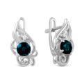 Серьги из серебра с нат.топазом лондон блю и фианитами родированные
