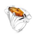 Кольцо из серебра с прес.нат.янтарём родированное