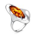 Кольцо из серебра с пресс.нат.янтарём родированное