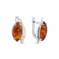 Серьги из серебра с янтарём и фианитами родированные
