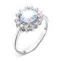 Кольцо из серебра с топазом и фианитами родированное