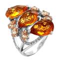 Кольцо из серебра с пл.кварцем цв.цитрин и фианитами родированное