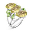 Кольцо из серебра с пл.кварцем цв.хризолит и фианитами родированное
