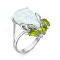 Кольцо из серебра с синт.опалом, кварцем и фианитами родированное