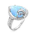 Кольцо из серебра с голубым опалом и фианитами родированное