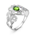 Кольцо из серебра с пл.кварцем цв.хризолит и фианитами родированное