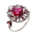 Кольцо из серебра с пл.кварцем цв.гранат и фианитами родированное