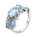 Кольцо из серебра с пл. кварцем цв. голубой и фианитами родированное