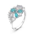 Кольцо из серебра с пл. кварцем цв. лунный камень, цв. Sky топаз и фианитами родированное