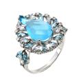 Кольцо из серебра с пл.кварцем цв.лунный голубой и фианитами родированное
