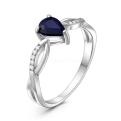 Кольцо из серебра с нат.сапфиром и фианитами родированное