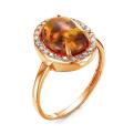 Кольцо из золочёного серебра с прес.нат.янтарём и фианитами
