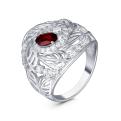 Кольцо из серебра с гранатом и фианитами родированное