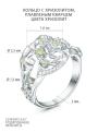 Кольцо из серебра с хризолитом, плавленым кварцем цвета хризолит и фианитами родированное