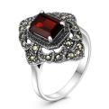 Кольцо из чернёного серебра с натуральным гранатом и марказитами