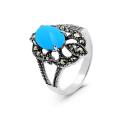 Кольцо из чернёного серебра с рек. бирюзой и марказитами