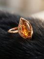 Кольцо из золочёного серебра с пресс. нат. янтарём