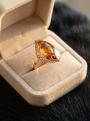 Кольцо из золочёного серебра с пресс. нат. янтарём