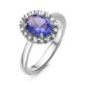 Кольцо из серебра с ситаллом цв.танзанит и куб.цирконием родированное