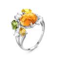 Кольцо из серебра с пл.кварцем цв.цитрин,олива и фианитами родированное