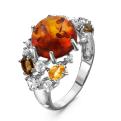 Кольцо из серебра с прес.нат.янтарём, пл.кварцем и фианитами родированное