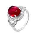Кольцо из серебра с красным пл.кварцем и фианитами родированное