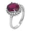 Кольцо из серебра с рубиновым корундом и фианитами родированное