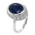 Кольцо из серебра с сапфировым корундом и фианитами родированное