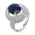 Кольцо из серебра с сапфировым корундом и фианитами родированное