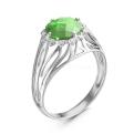 Кольцо из серебра с пл.кварцем цв.хризолит и фианитами родированное